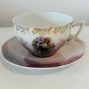 Antique vintage porcelain cup & saucer iridescent glaze and hand-painted woman